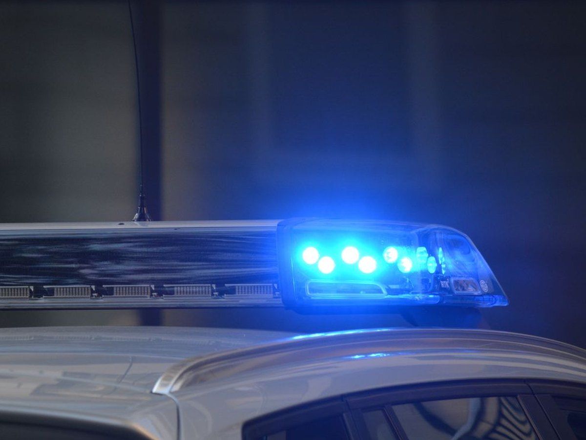 Emergency light glowing on a vehicle at night